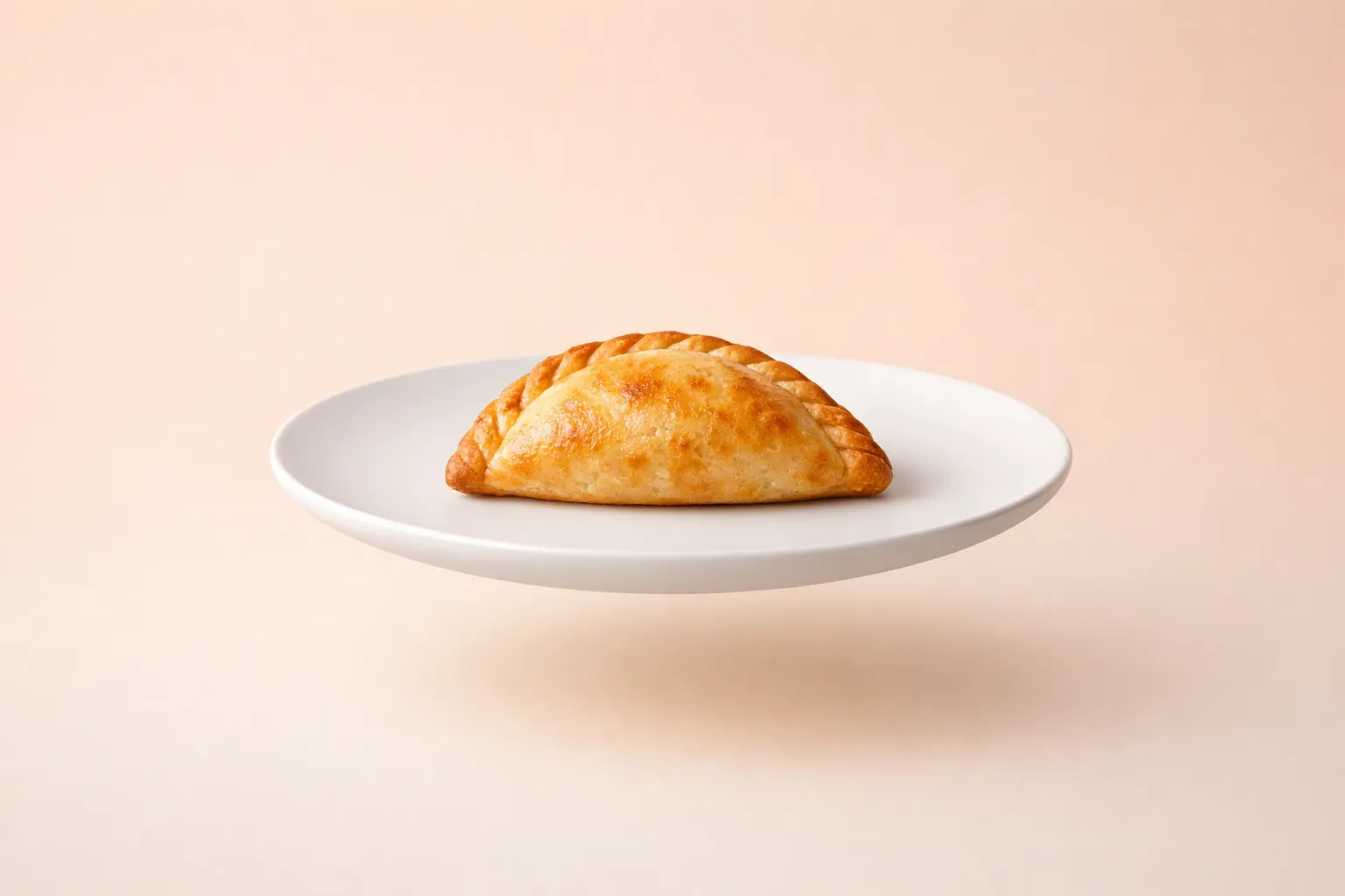 Portada de la receta Empanadas de quinoa y ají amarillo al horno