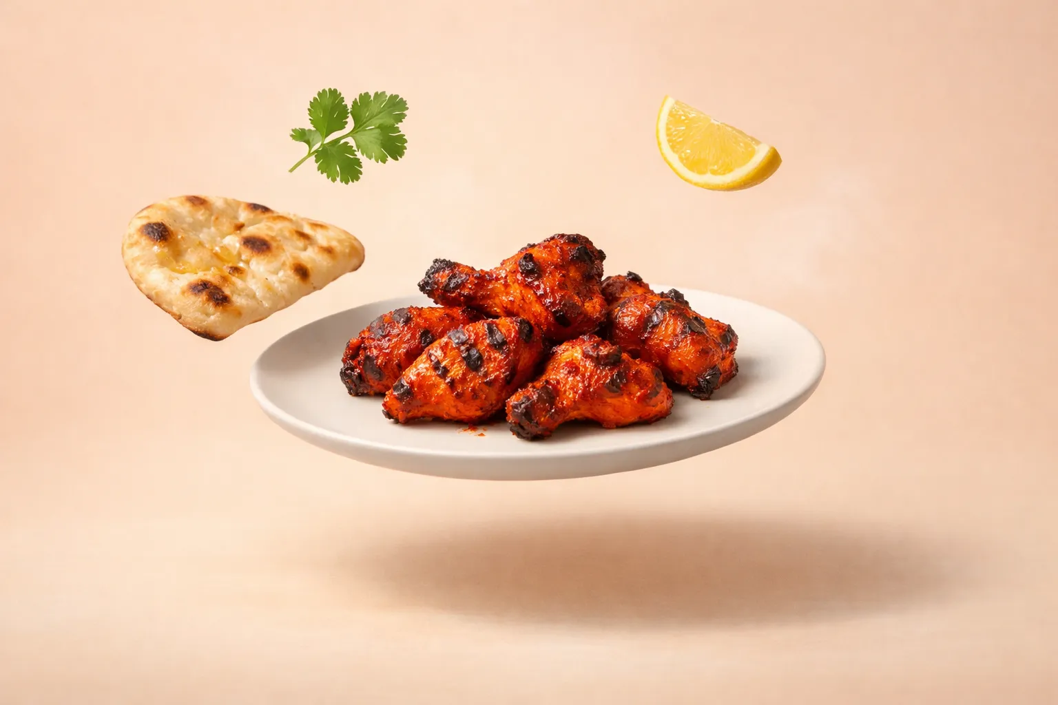Portada de la receta Pollo Tandoori rojo con naan de ajo y mantequilla